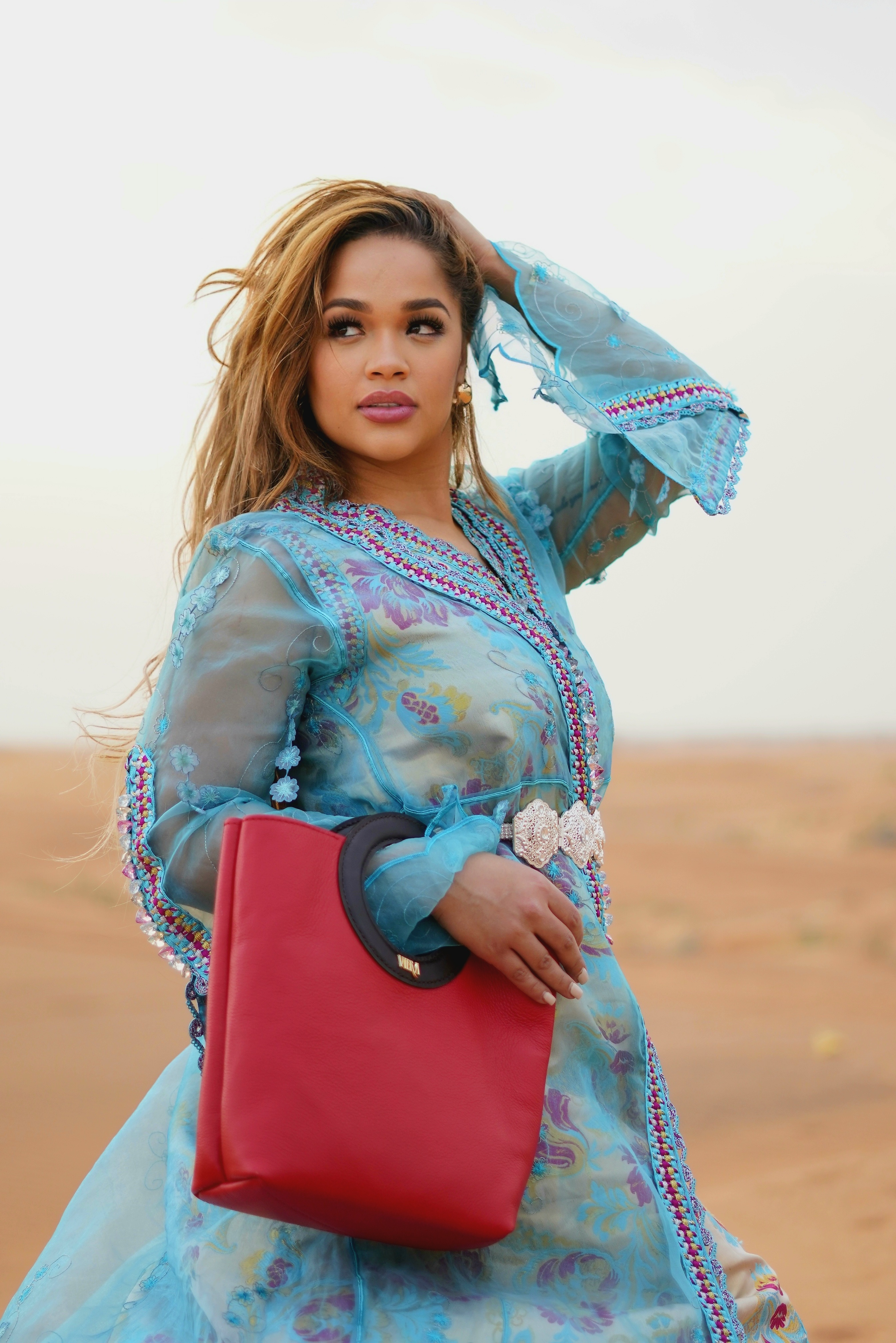 Featured at the Dubai Latin Fashion Award. Our signature red tote bag, crafted with premium leather and timeless design. A statement piece that celebrates style and sophistication.