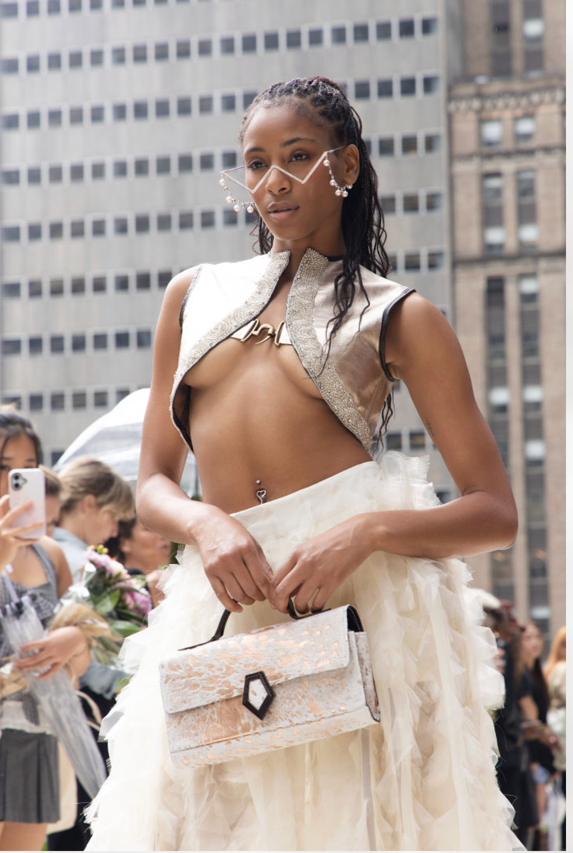 The Metallic Cowhide Top-Handle Clutch – Rose Gold Edition